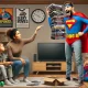 A-comical-and-exaggerated-family-living-room-scene-where-a-mother-and-father-are-debating-in-front-of-a-TV.-The-father-wearing-a-superhero-themed-out